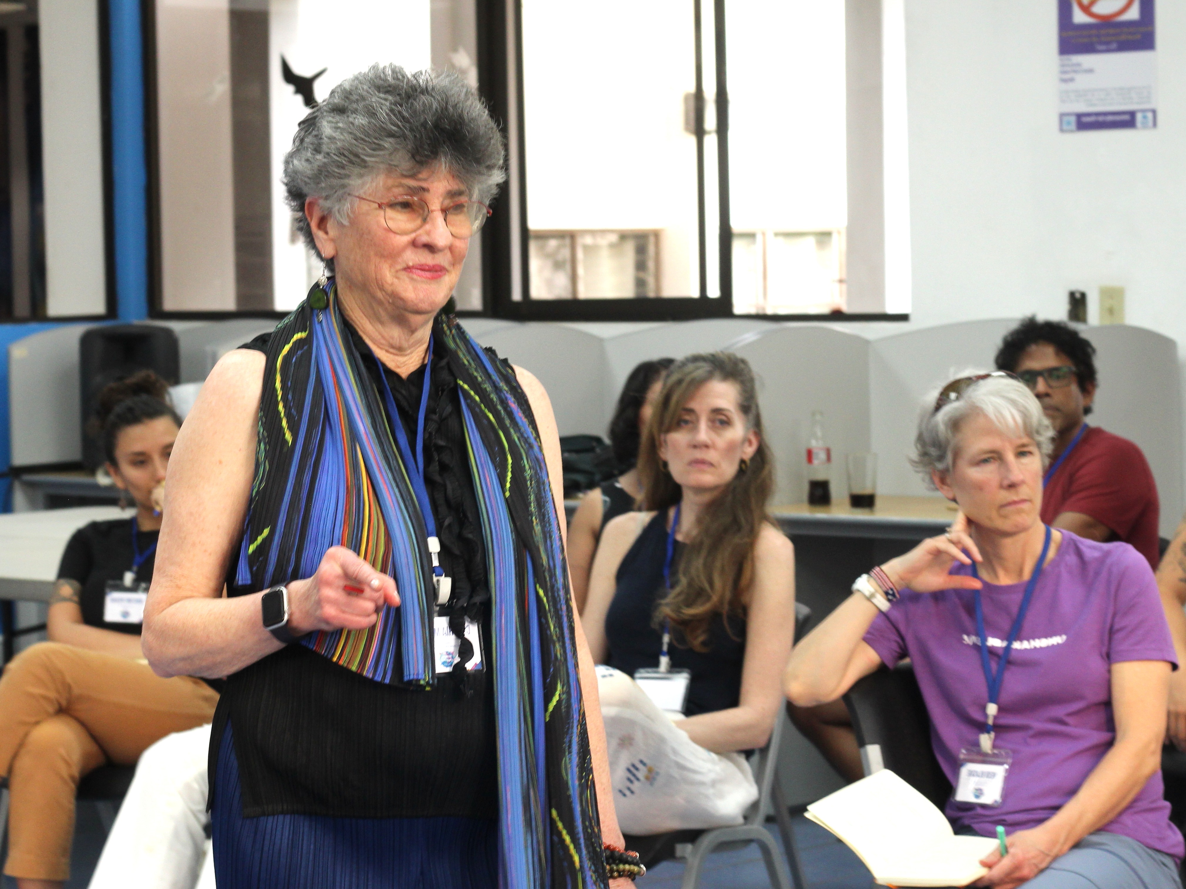 Participant speaking during a UPEACE learning experience